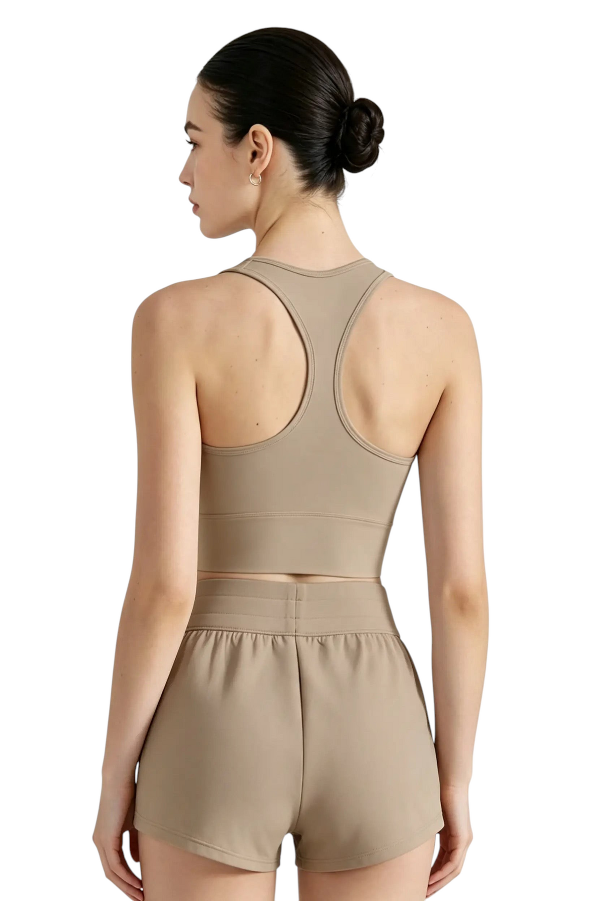 Vue arrière d'une femme portant la brassière de sport beige JOY-STYLE Sculpt avec un dos nageur