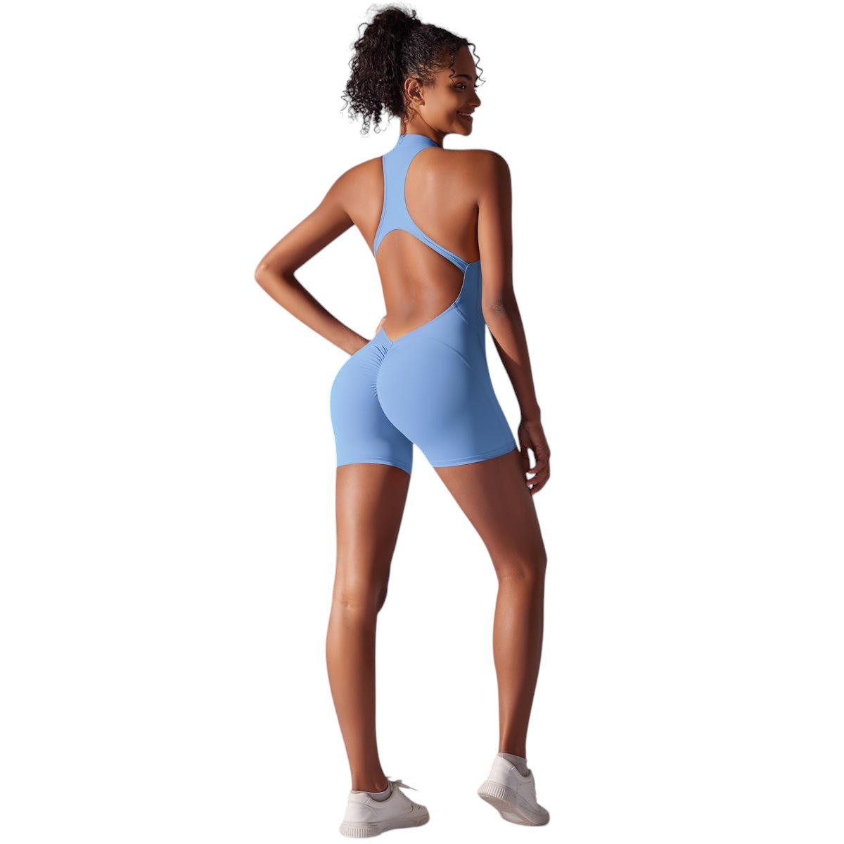 JOY-STYLE light blue athletic romper with open back and ruched shorts, perfect for yoga and fitness.