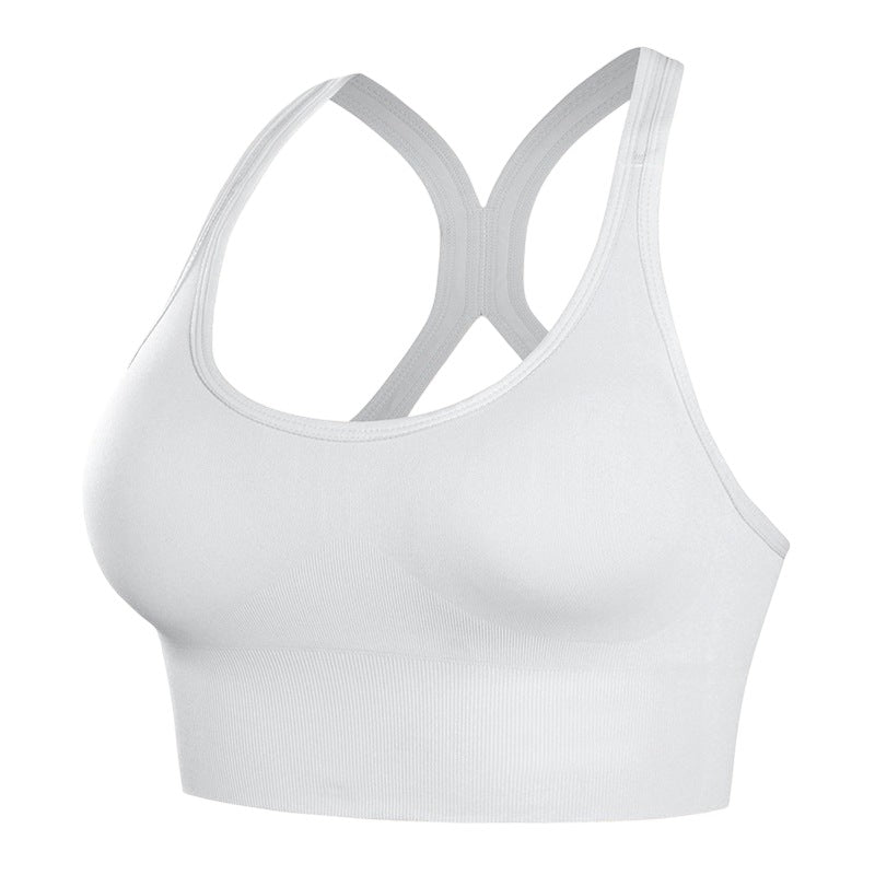 Brassière de sport blanche JOY-STYLE Curve Active à dos nageur, offrant un maintien renforcé et un confort respirant.